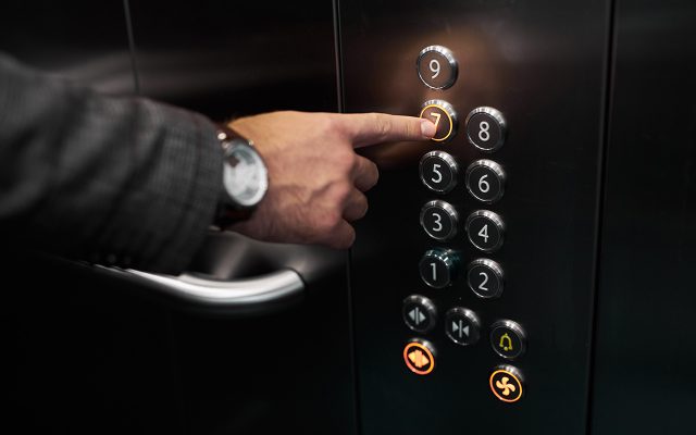 Selecting The Seventh Floor On An Elevator Button Panel